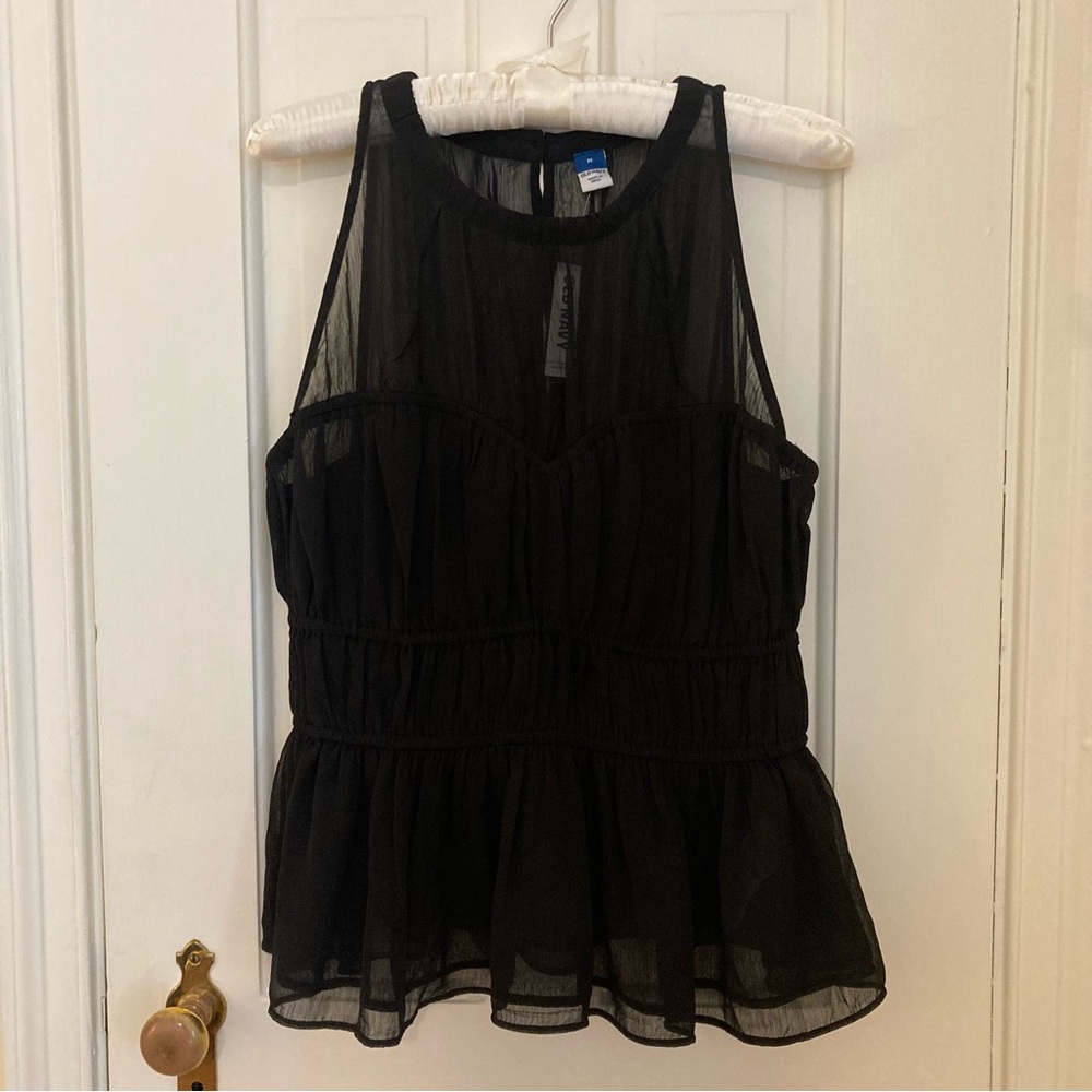 Black semi-sheer top with ruffles